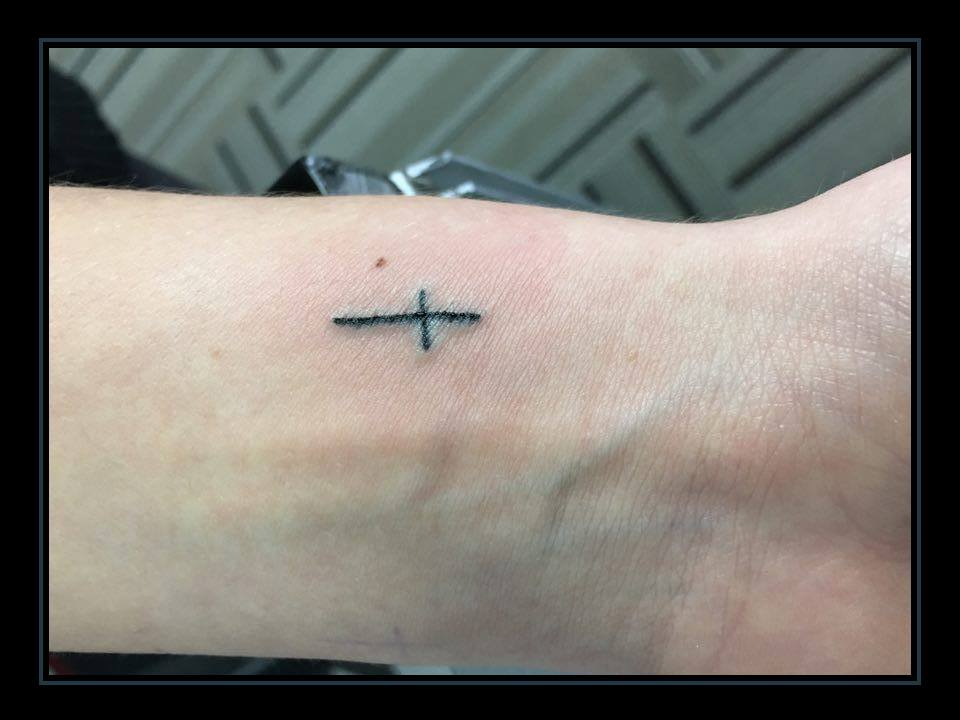 small cross tattoo