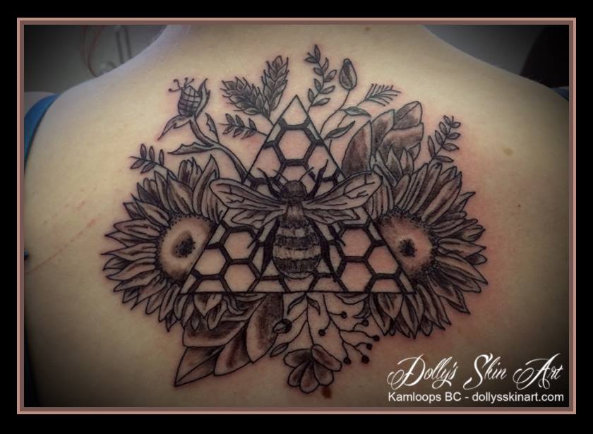 bee sunflowers thistle black grey shaded linework honeycomb back tattoo kamloops dolly's skin art