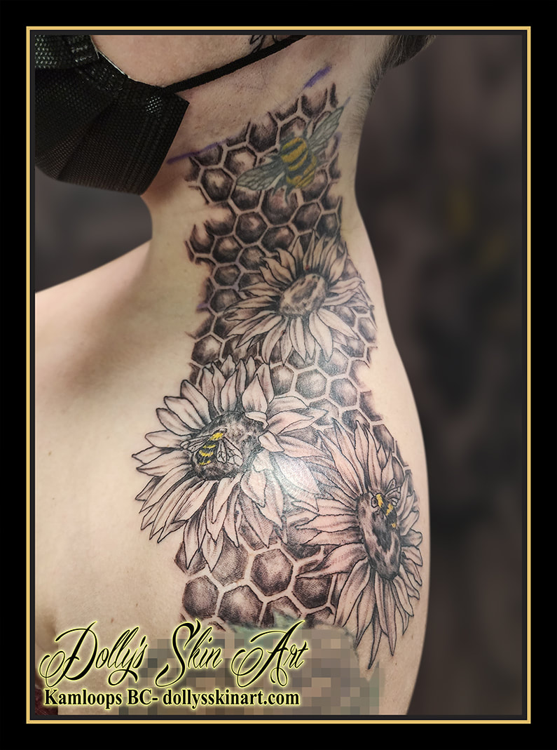 sunflower tattoo honeycomb black and grey shading bee yellow shoulder neck tattoo kamloops dolly's skin art