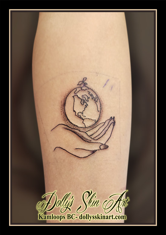 earth hand tattoo care for the earch black line work tattoo kamloops dolly's skin art