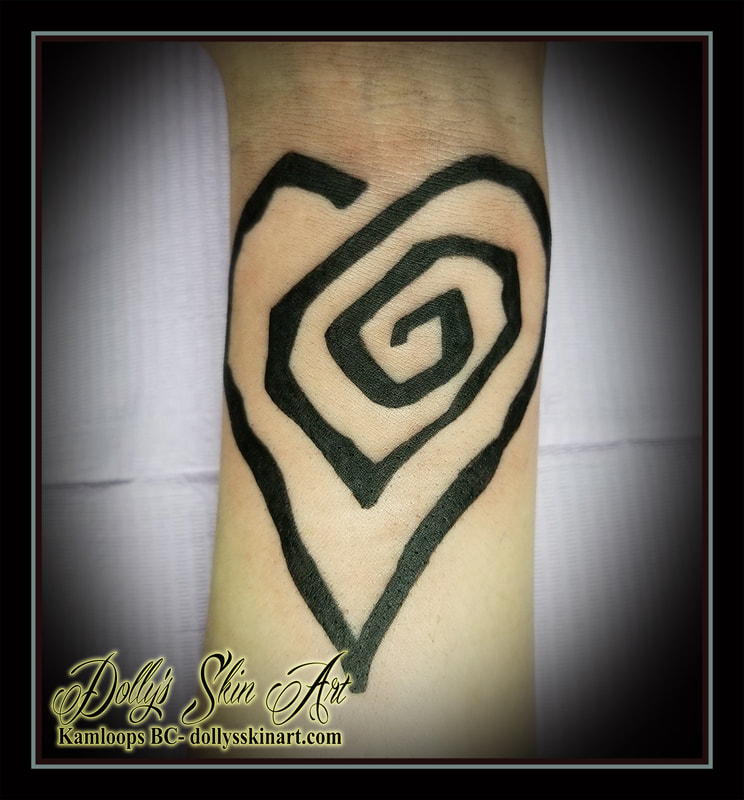 black linework spiral jagged heart design wrist solid tattoo kamloops dolly's skin art