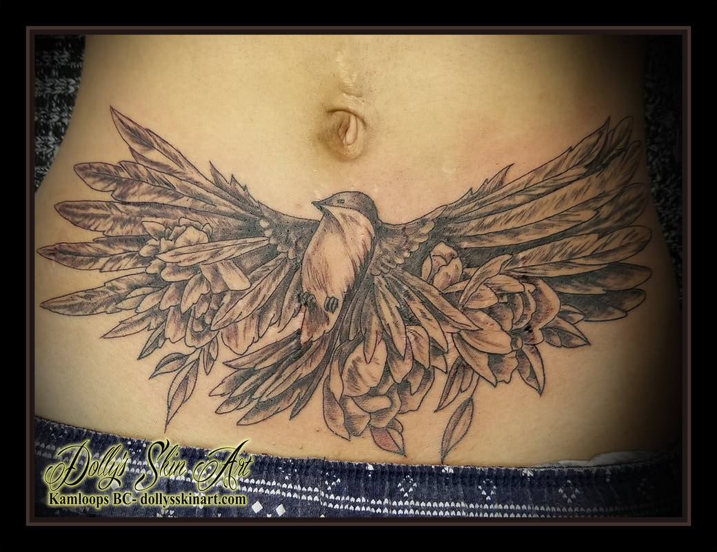 black and grey shaded bird flowers pelvis stomach tattoo kamloops dolly's skin art