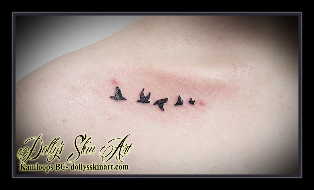 5 small black birds on collarbone tattoo kamloops dolly's skin art