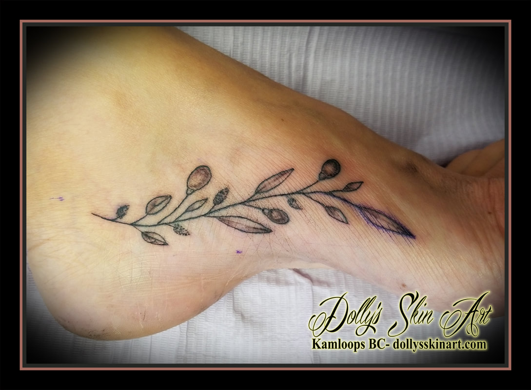 olive branch small black linework foot shaded tattoo kamloops tattoo dolly's skin art