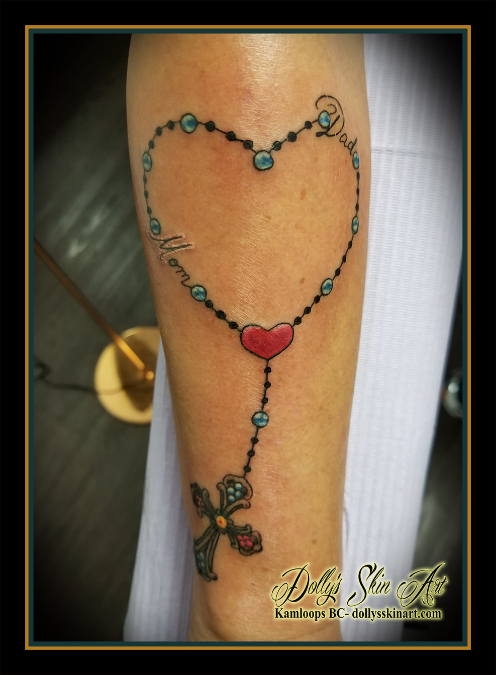 rosary colour heart forearm beads cross yellow blue red mom dad tattoo kamloops tattoo dolly's skin art