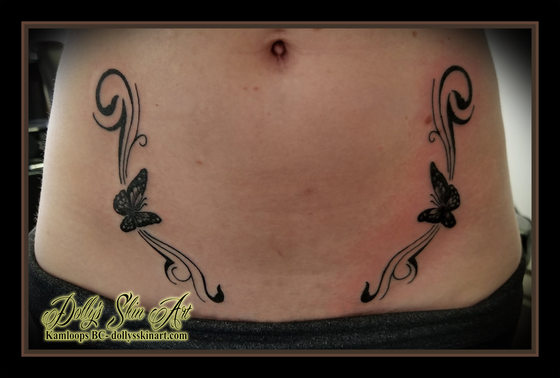 butterfly filigree black grey shading hip pelvis stomach tattoo kamloops tattoo dolly's skin art