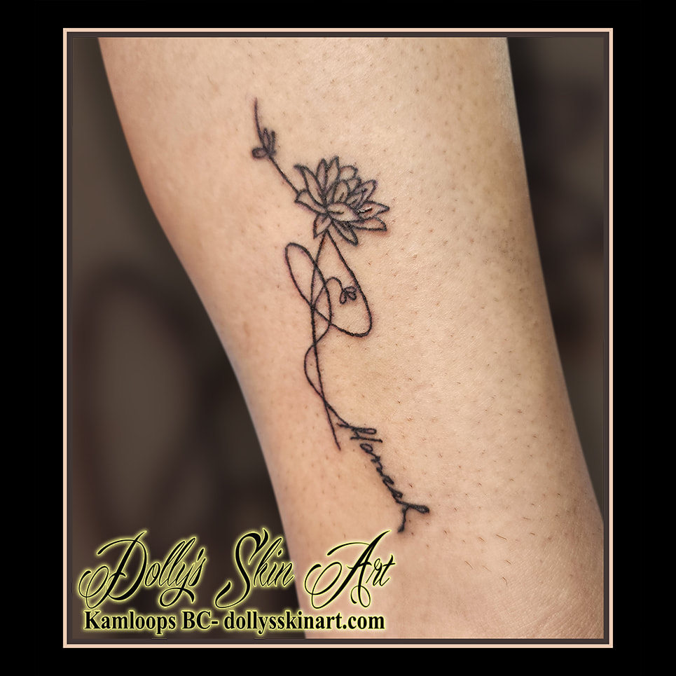 flower tattoo line work black arm tattoo kamloops dolly's skin art