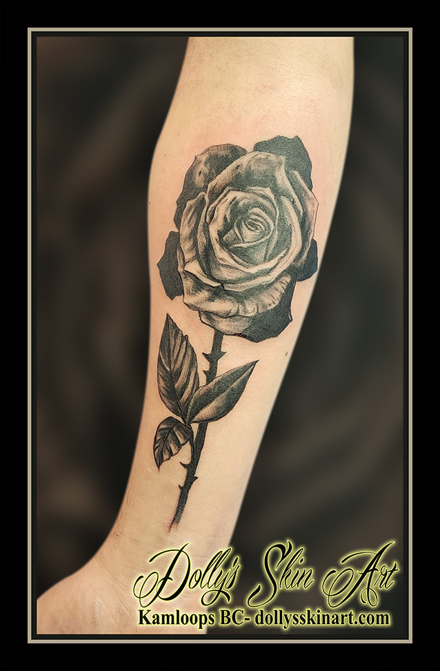 rose tattoo flower black forearm tattoo kamloops dolly's skin art