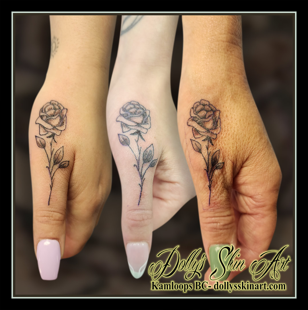 Mother Daughter rose tattoo thumb hand black line work tattoo kamloops dolly's skin art
