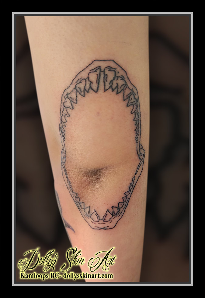 shark jaw tattoo black and grey shading elbow line work teeth tattoo kamloops dolly's skin art