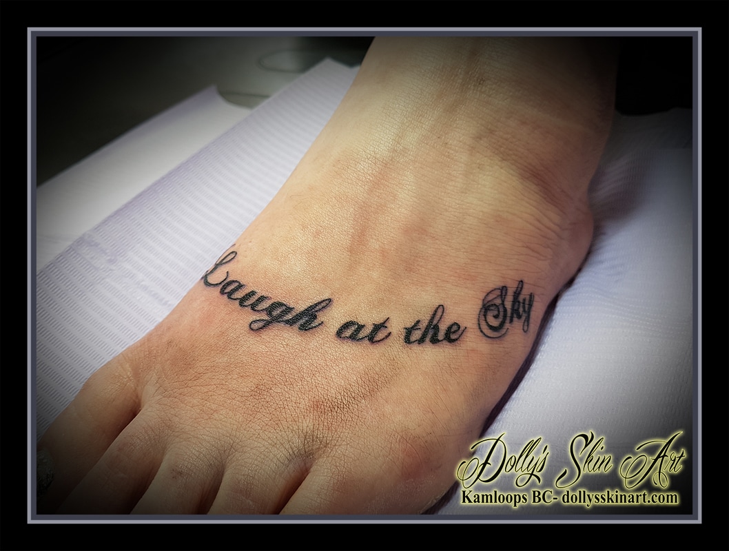 laugh at the sky foot tattoo font lettering black kamloops dolly's skin art