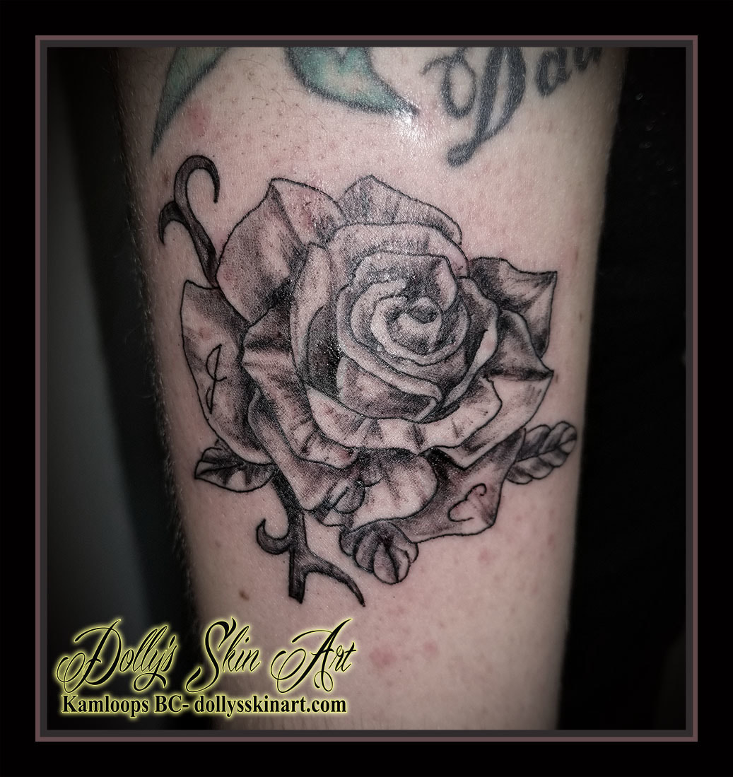 black and grey shaded rose small initials j d e tattoo kamloops dolly's skin art