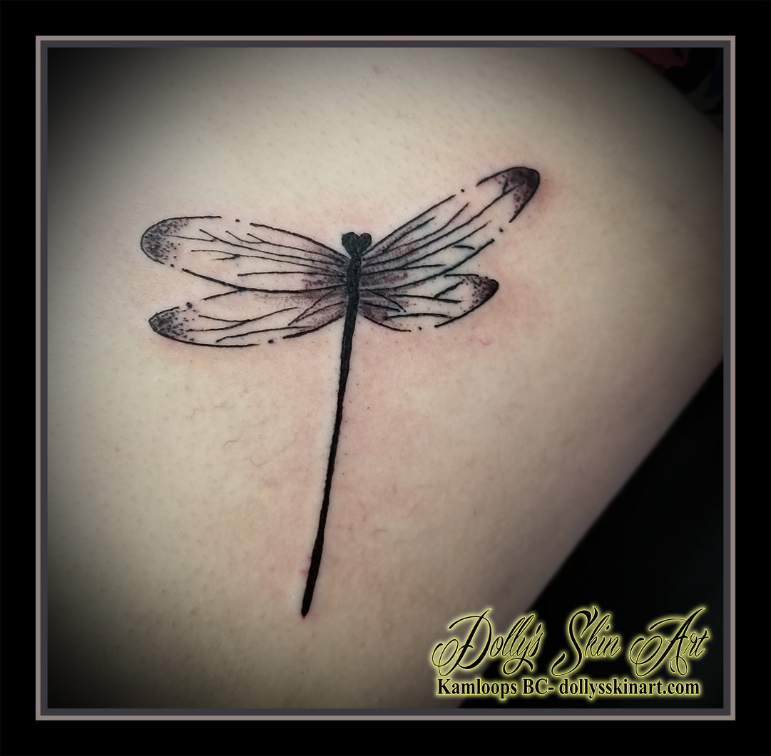 black and grey dragonfly shading stippling blackwork kamloops tattoo dolly's skin art