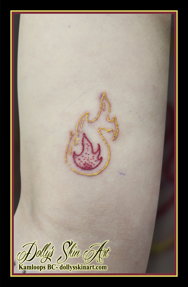 fire tattoo red yellow linework tattoo kamloops dolly's skin art