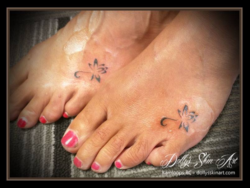 small black lotus matching foot tattoo kamloops dolly's skin art