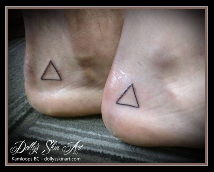 small black matching line triangle foot feel tattoo kamloops dolly's skin art