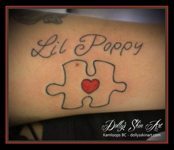 small puzzle piece red heart lil poppy lettering font family tattoo kamloops dolly's skin art