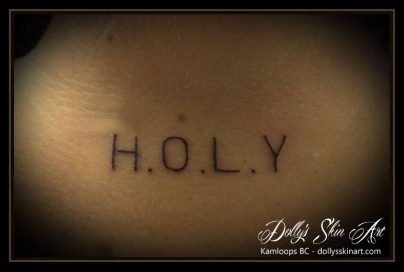 holy h.o.l.y simple small black font lettering tattoo kamloops dolly's skin art