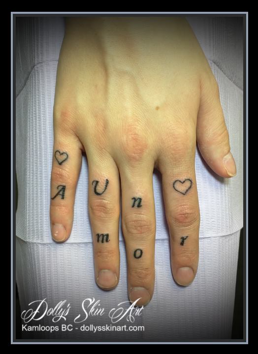 hand finger knuckle lettering font heart un amor one love black tattoo kamloops dolly's skin art