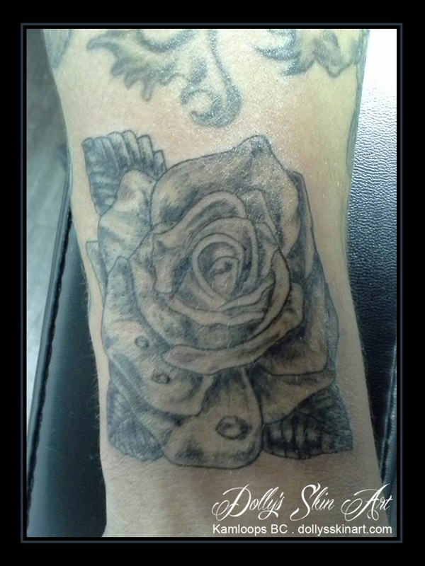black rose wrist tattoo