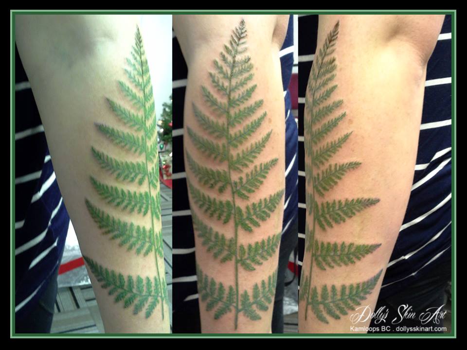 green fern arm tattoo