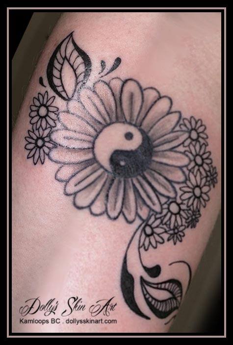 kaylee's black daisies tattoo