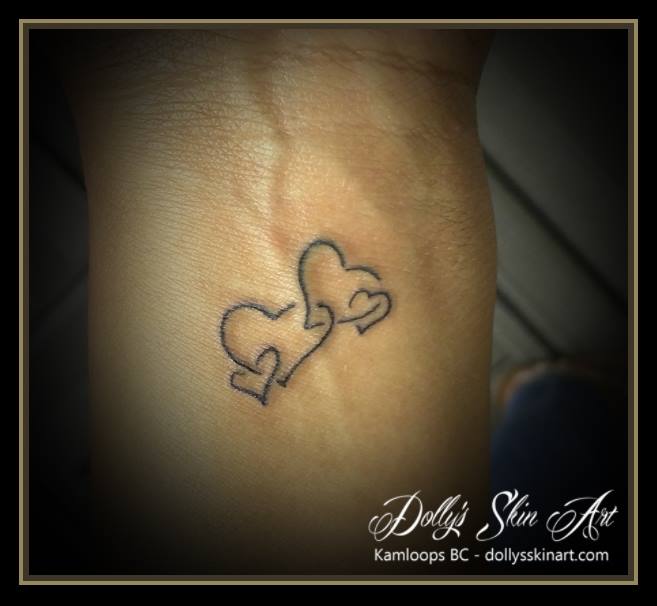 black small hearts family tattoo