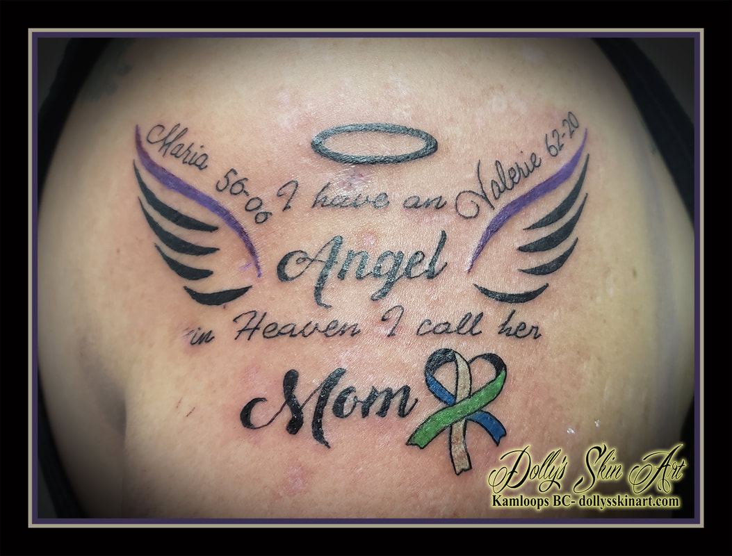 i have an angel in heaven i call her mom tattoo lettering script black purple blue green val wings halo heart ribbon elephant memorial family tattoo kamloops dolly's skin art
