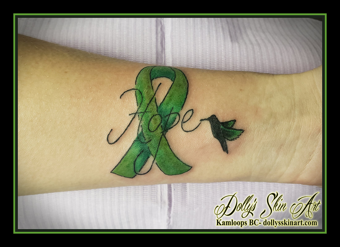 green ribbon tattoo hope bird black green forearm mental health tattoo dolly's skin art kamloops
