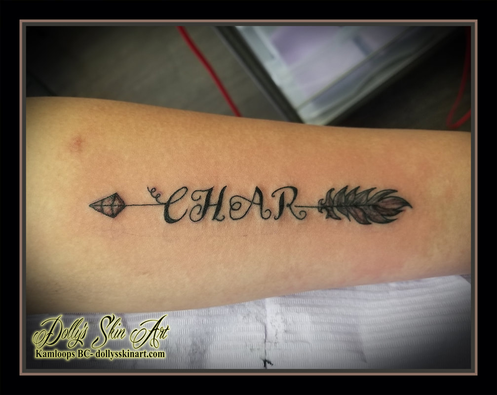 family name tattoo arrow script font lettering CHAR black and grey shading tattoo kamloops dolly's skin art