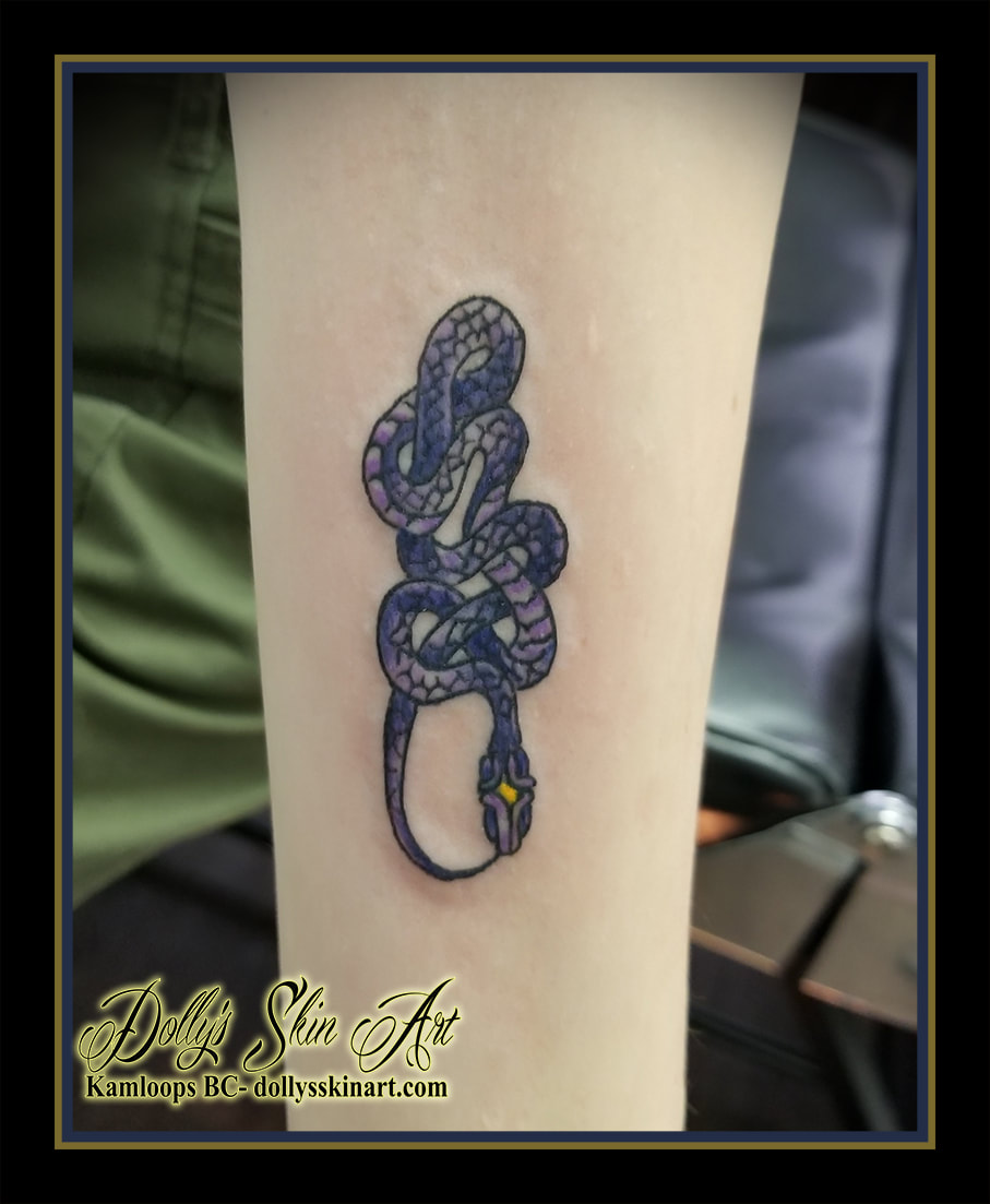 small purple snake design yellow forearm little tattoo kamloops tattoo dolly's skin art