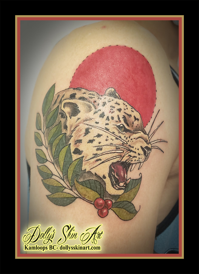 cheetah tattoo red sun leaves berries colour green black brown red shoulder big cat tattoo dolly's skin art kamloops