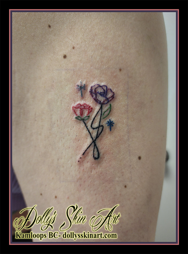 flower tattoo linework rose star red green black purple blue tattoo kamloops dolly's skin art