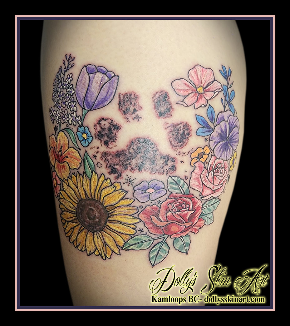 paw print tattoo flowers floral colour leg sunflower rose forget me not tulip lilac pink blue yellow purple brown orange red white green black shading tattoo dolly's skin art kamloops british columbia