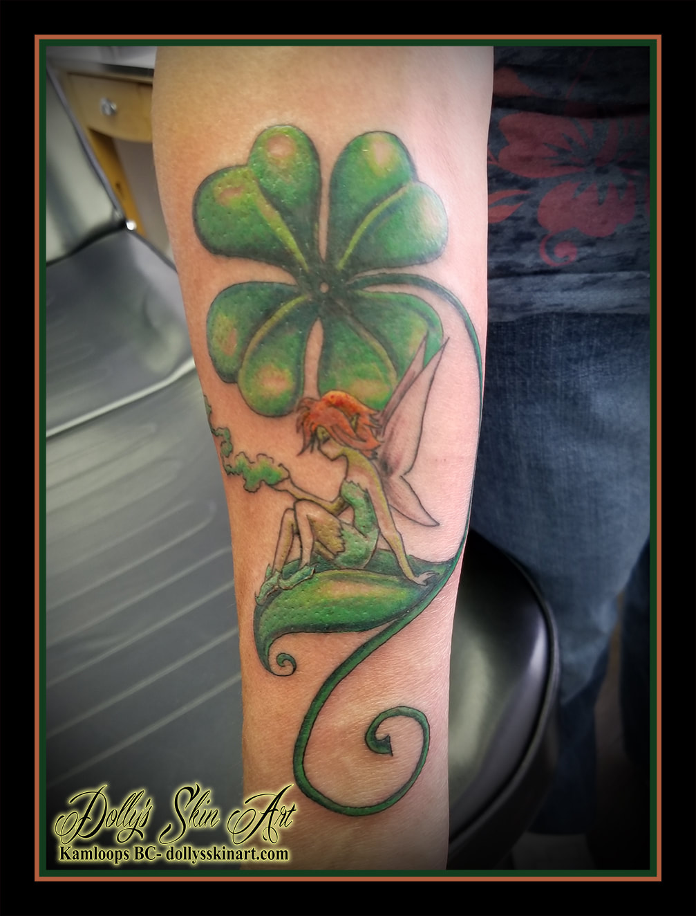 irish cartoon fairy girl sit on leaf clover smoke green orange forearm tattoo kamloops dolly's skin art
