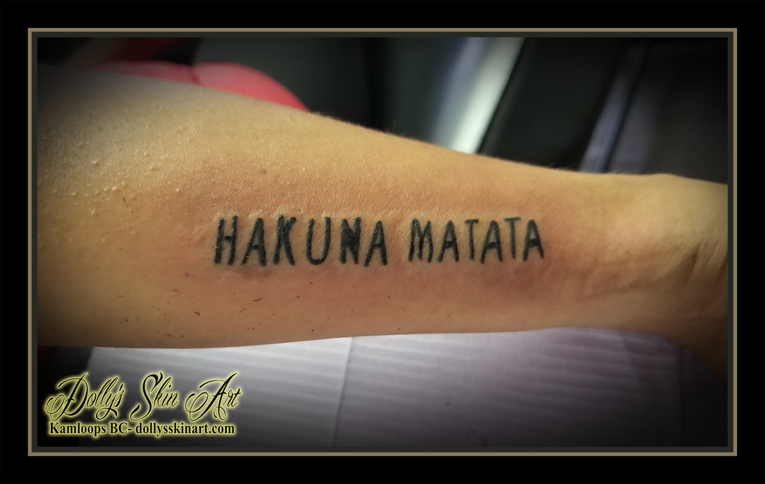 hakuna matata tattoo swahili disney lion king lettering font script blackwork forearm matching there are no troubles tattoo kamloops dolly's skin art