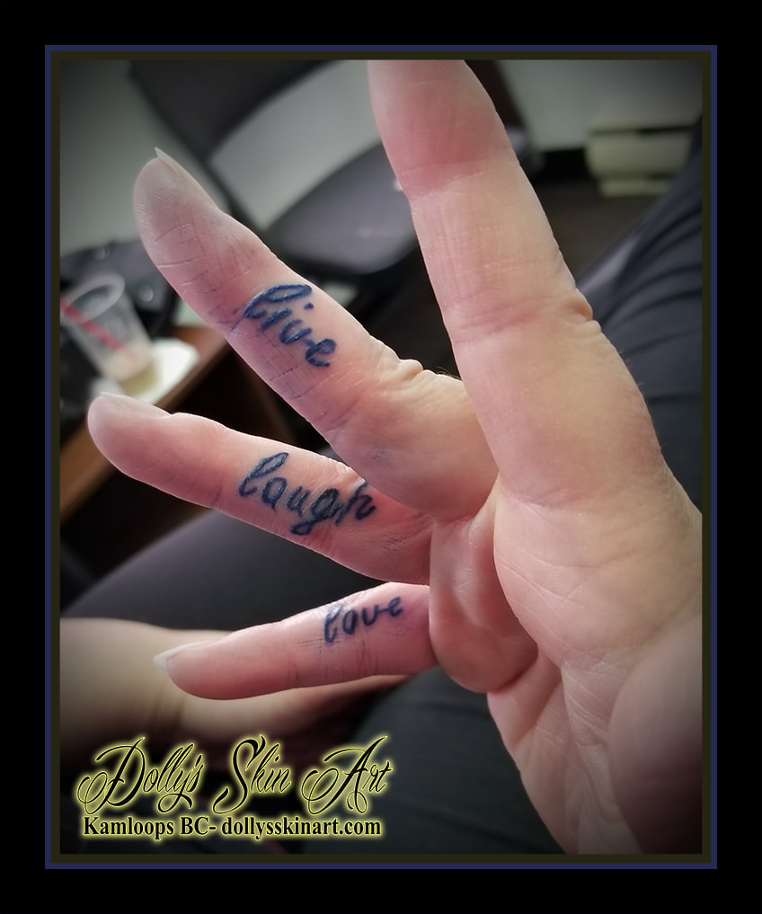 live laugh love blue handwriting script finger hand tattoo kamloops dolly's skin art