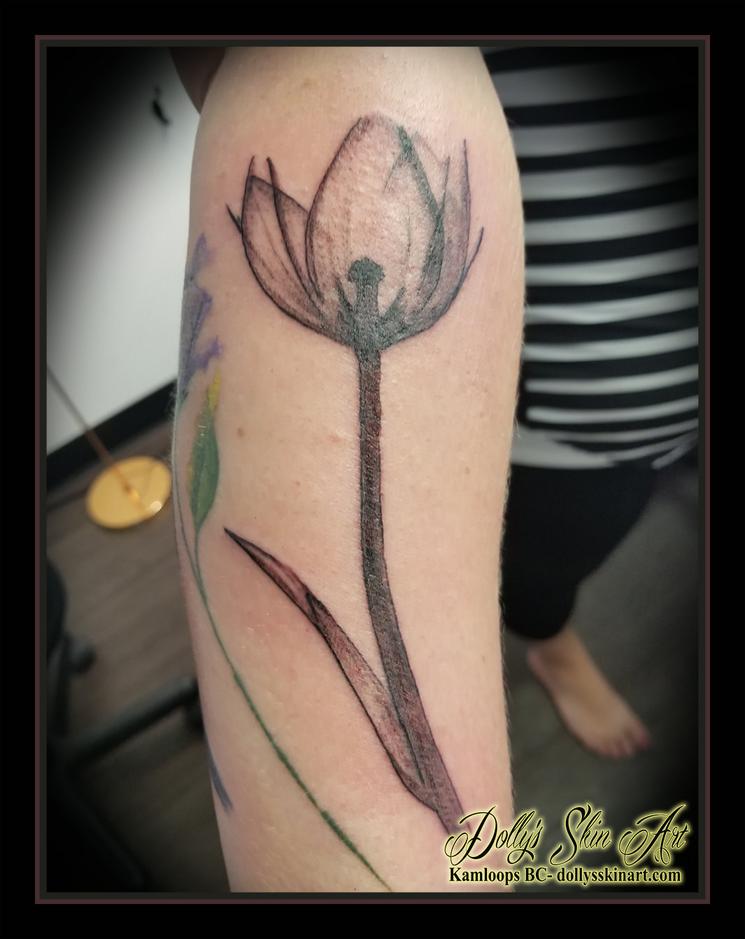 x-ray flower tattoo black and grey xray tulip floral forearm shading tattoo kamloops dolly's skin art