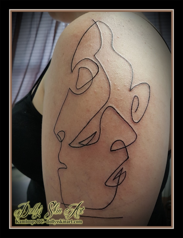 abstract faces linework single line black arm shoulder tattoo kamloops dolly's skin art