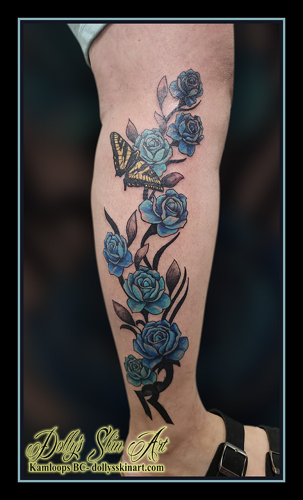 blue roses tattoo floral black leg calf butterfly yellow brown vines tattoo kamloops dolly's skin art