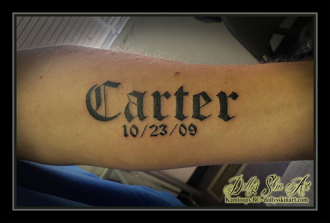 carter tattoo child name black lettering font script forearm tattoo kamloops dolly's skin art