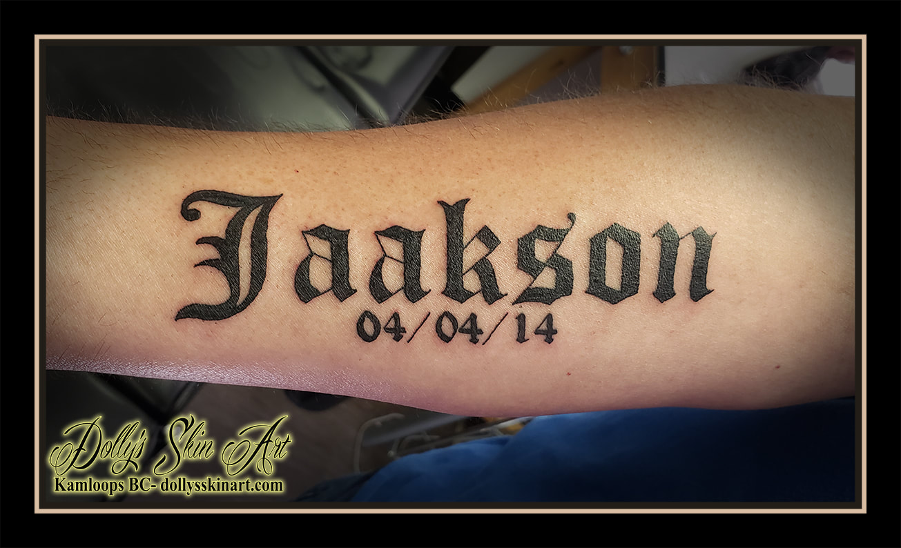 jaakson tattoo child name black lettering font script forearm tattoo kamloops dolly's skin art
