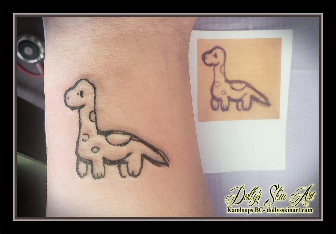 Coby's little dinosaur drawn by their friend - Dolly's Skin Art Tattoo  Kamloops BC