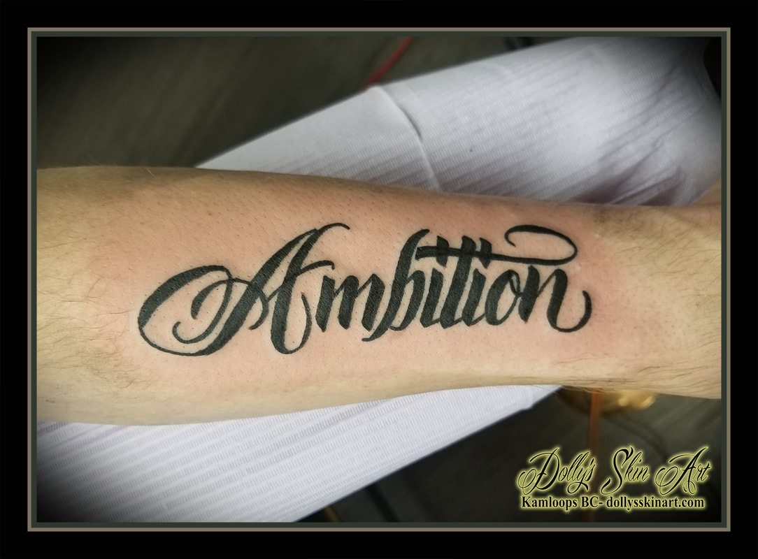 ambition black font lettering script forearm tattoo kamloops tattoo dolly's skin art