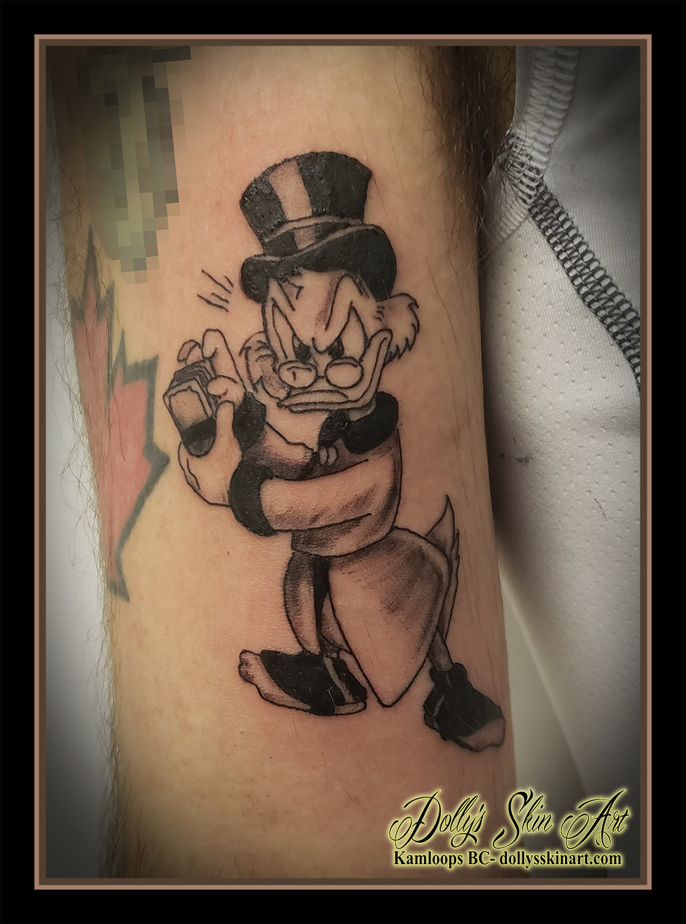 Scrooge McDuck tattoo animated cartoon black linework outline disney pekin duck uncle scrooge tattoo kamloops dolly's skin art