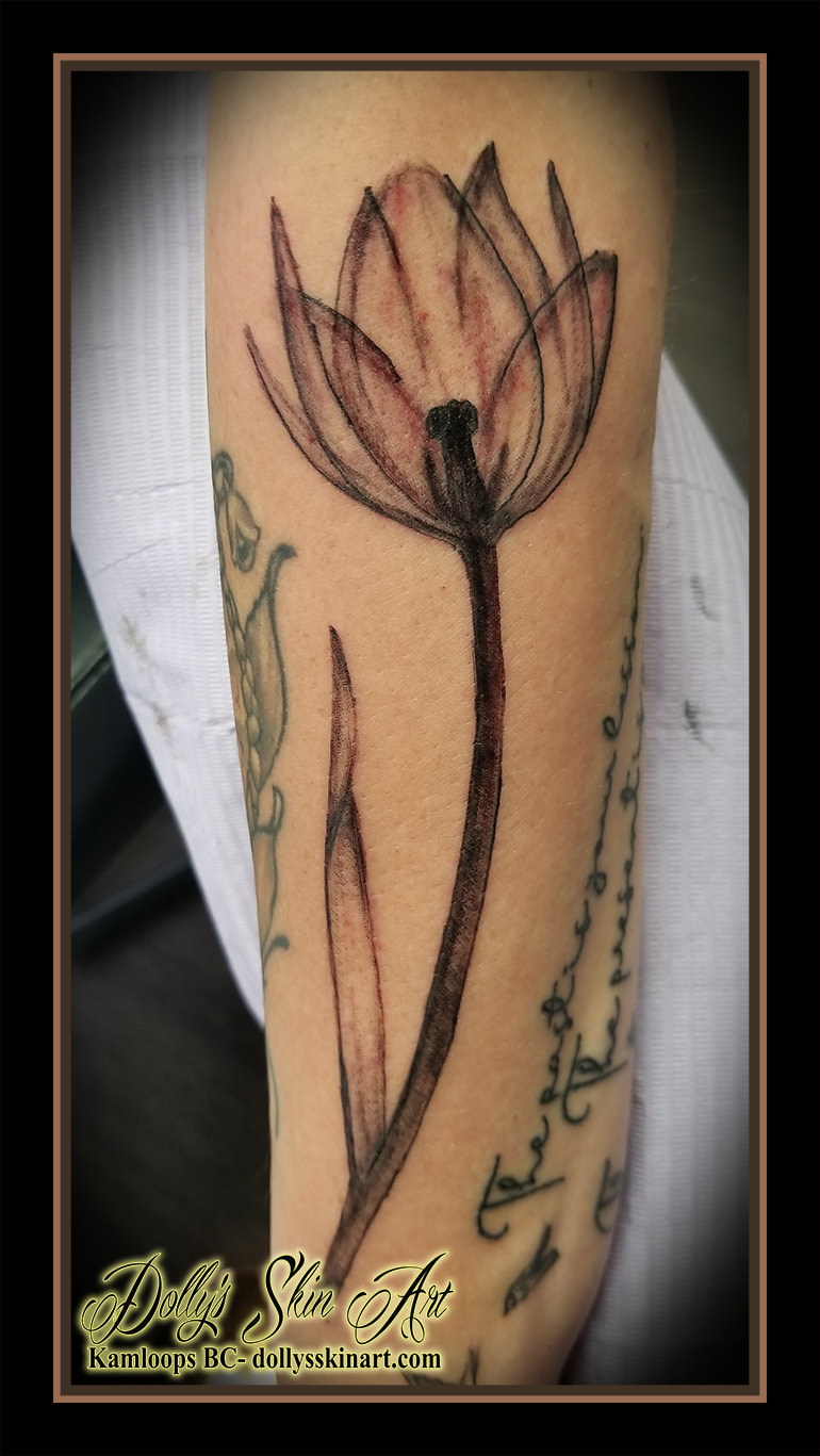 X-Ray flower tattoo xray black and grey shaded arm tattoo kamloops dolly's skin art
