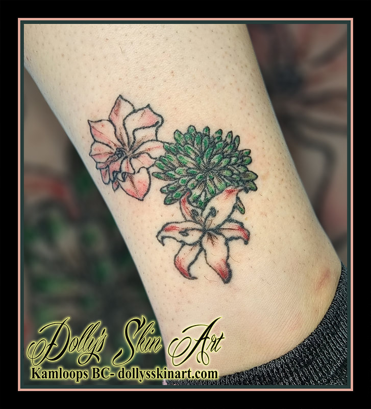 flower tattoo colour floral pink green ankle tattoo kamloops dolly's skin art