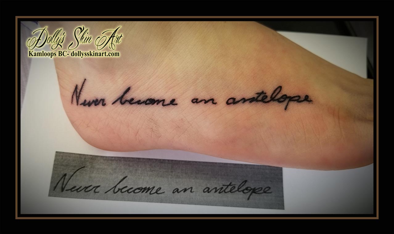 Never become an antelope lettering font phrase handwriting script foot black linework tattoo kamloops dolly's skin art