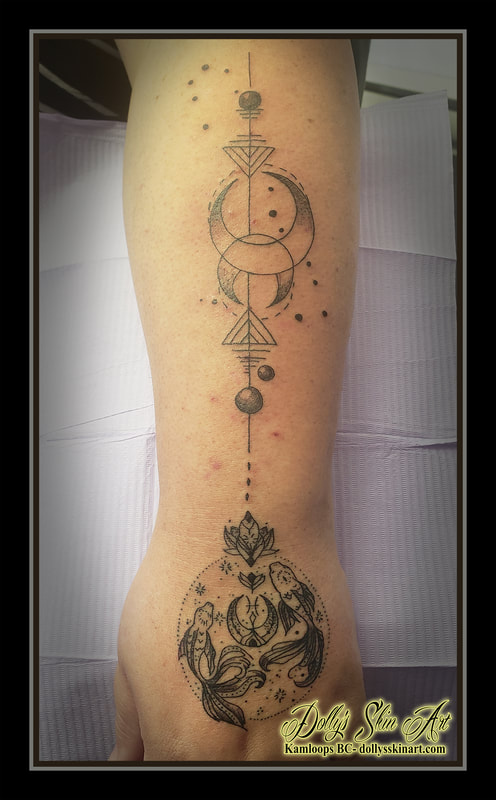 Pisces geometric tattoo black and grey stipple shadingfish moons flower forearm hand tattoo kamloops dolly's skin art