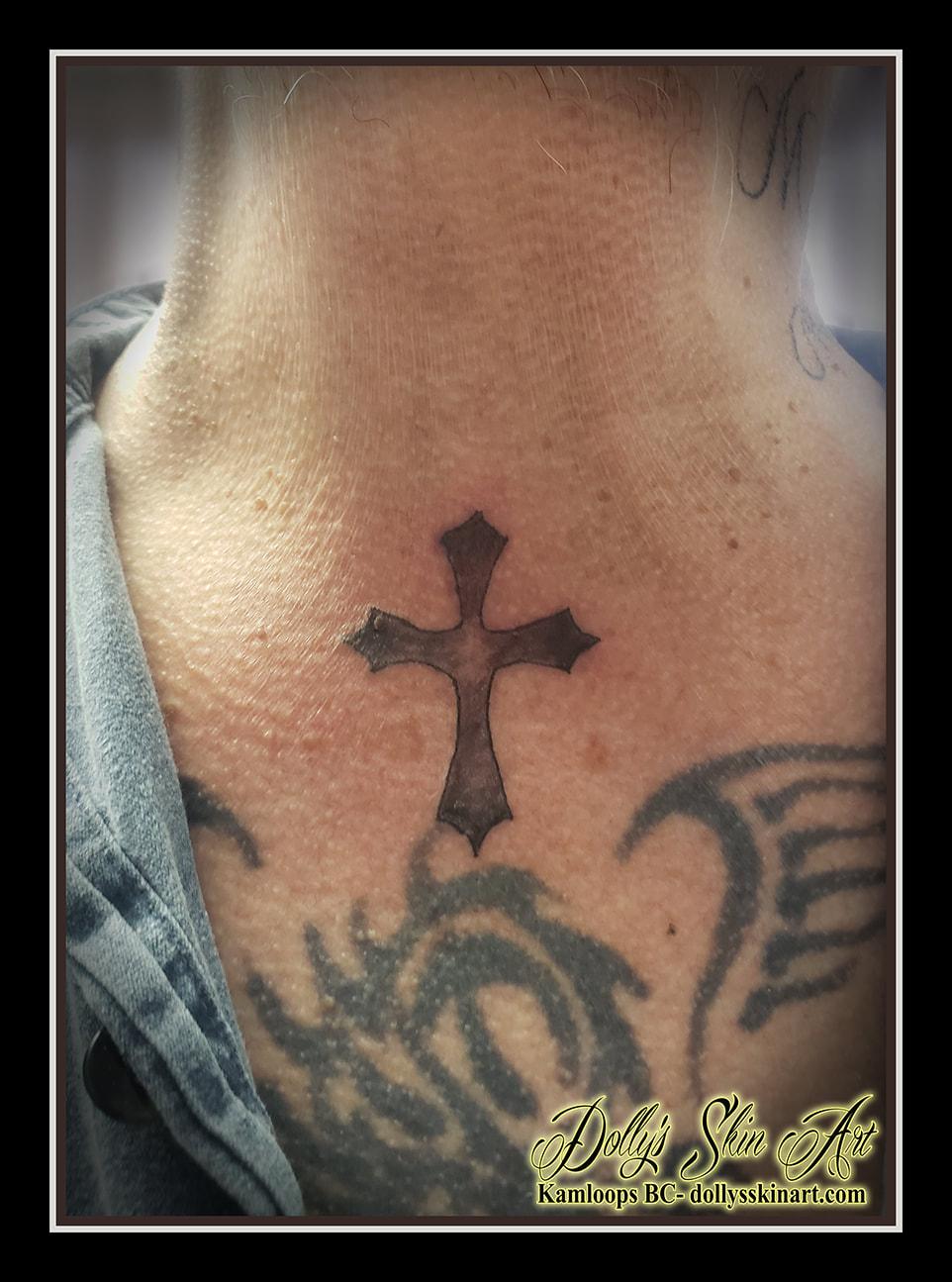 cross tattoo black and grey shading chest collarbone tattoo dolly's skin art kamloops